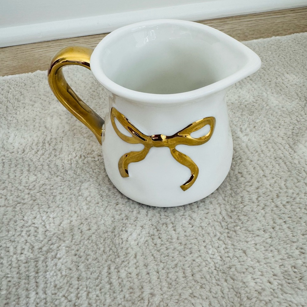 White Ceramic creamer with Gold Bow Accent